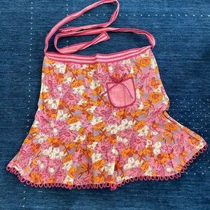 Adult apron, knee length- approx. 20.5” long with floral pattern and pocket